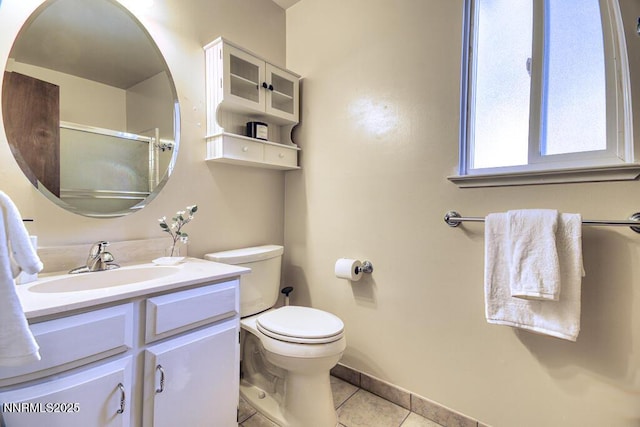 128 Holly Ln Unit B, Stateline, NV 89449 - bathroom featuring tile patterned floors, vanity, and a shower with door