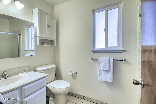128 Holly Ln Unit B, Stateline, NV 89449 - bathroom with tile patterned flooring, vanity, healthy amount of natural light, and a shower stall