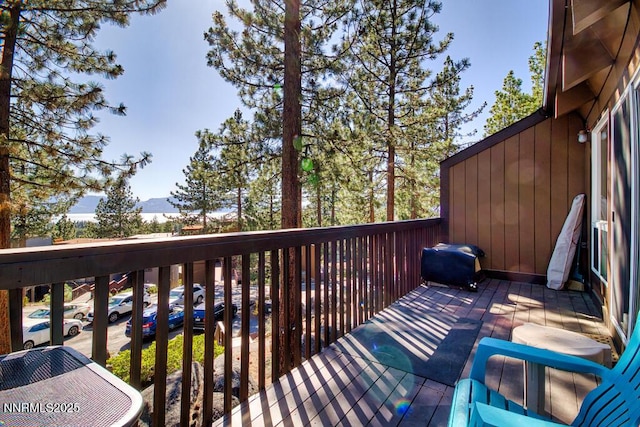 128 Holly Ln Unit B, Stateline, NV 89449 - wooden terrace with a grill and a mountain view