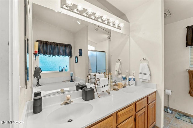 976 Leah Cir, Reno, NV 89511 - bathroom with double vanity, a bath, and tile patterned floors