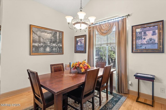 976 Leah Cir, Reno, NV 89511 - dining room featuring a chandelier and light wood finished floors
