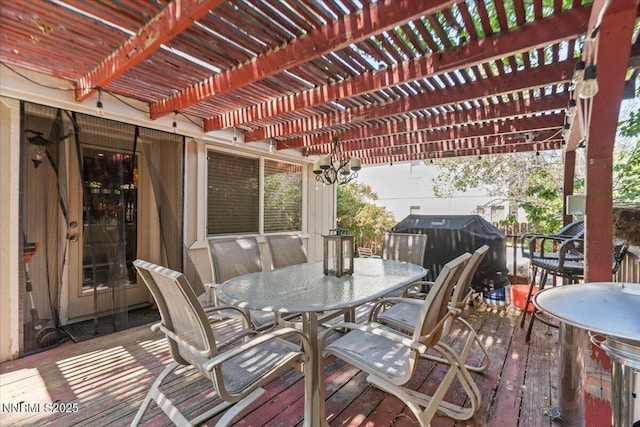 976 Leah Cir, Reno, NV 89511 - wooden deck featuring outdoor dining space, a grill, and a pergola