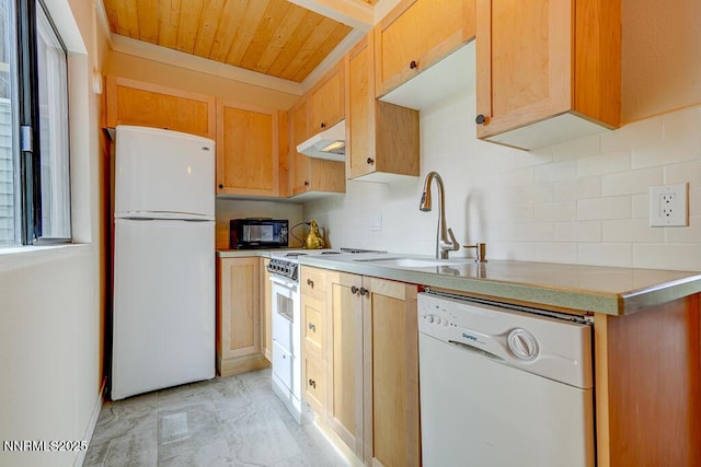 331 Tramway Dr Unit 17, Stateline, NV 89449 - kitchen featuring white appliances, under cabinet range hood, backsplash, wood ceiling, and light countertops