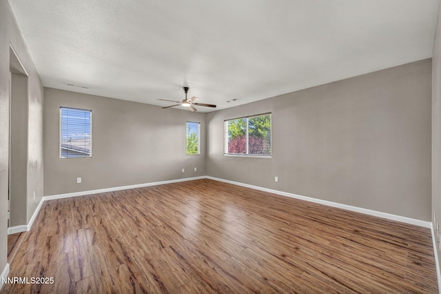 2182 Talladega Ct, Sparks, NV 89436 - spare room with wood finished floors and ceiling fan