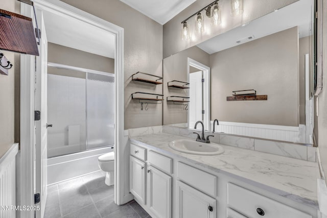 2182 Talladega Ct, Sparks, NV 89436 - bathroom featuring vanity, enclosed tub / shower combo, and tile patterned floors