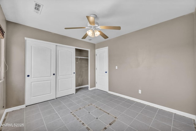 2182 Talladega Ct, Sparks, NV 89436 - unfurnished bedroom featuring tile patterned floors, a closet, and a ceiling fan