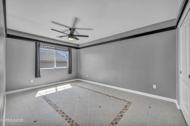 2182 Talladega Ct, Sparks, NV 89436 - tiled spare room featuring ceiling fan and baseboards