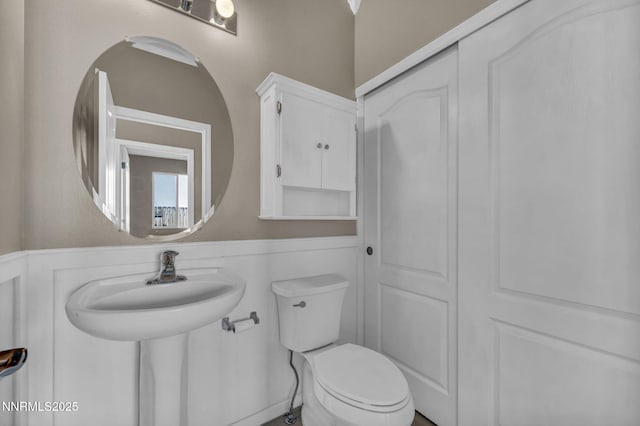2182 Talladega Ct, Sparks, NV 89436 - bathroom featuring wainscoting and toilet