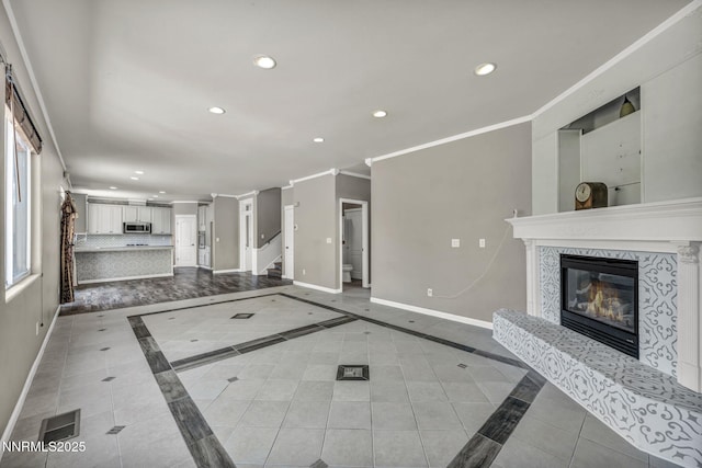 2182 Talladega Ct, Sparks, NV 89436 - unfurnished living room featuring recessed lighting, crown molding, a premium fireplace, inlaid floor details, and stairway
