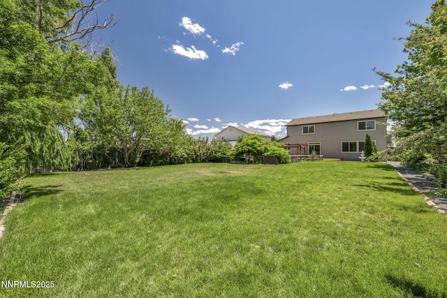 2182 Talladega Ct, Sparks, NV 89436 - view of grassy yard featuring a wooden deck