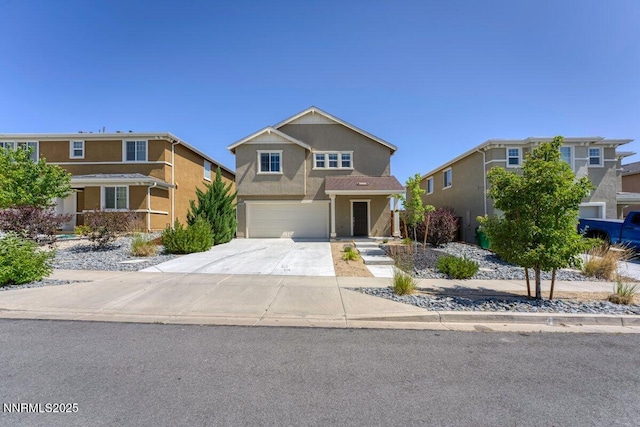 10965 Bloomsburg Dr, Reno, NV 89506 - traditional-style home featuring stucco siding, concrete driveway, and a garage