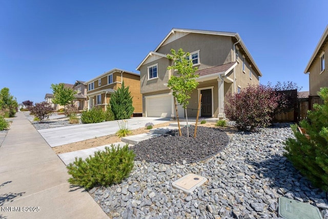 10965 Bloomsburg Dr, Reno, NV 89506 - traditional-style home featuring driveway, an attached garage, stucco siding, and a residential view