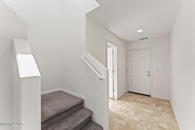 10965 Bloomsburg Dr, Reno, NV 89506 - stairway featuring stone finish flooring and recessed lighting