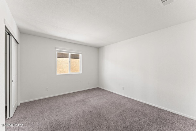 10965 Bloomsburg Dr, Reno, NV 89506 - unfurnished bedroom with carpet flooring and a closet