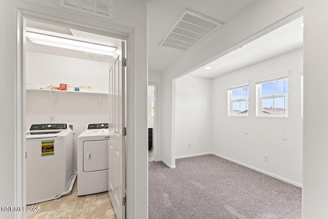 10965 Bloomsburg Dr, Reno, NV 89506 - laundry room featuring washing machine and dryer and light carpet