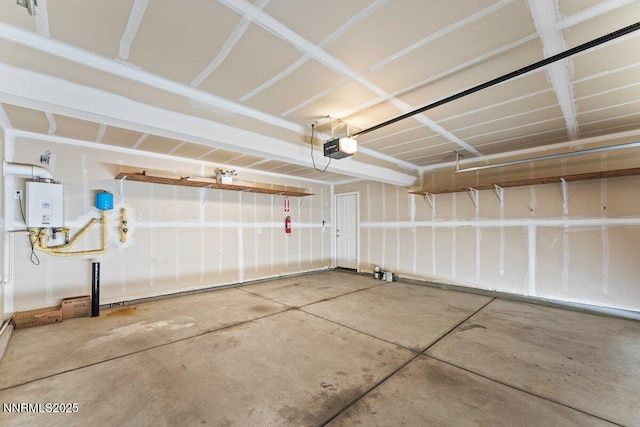 10965 Bloomsburg Dr, Reno, NV 89506 - garage with water heater and a garage door opener