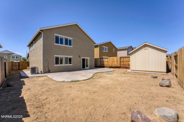 10965 Bloomsburg Dr, Reno, NV 89506 - back of property with a patio, a fenced backyard, and stucco siding