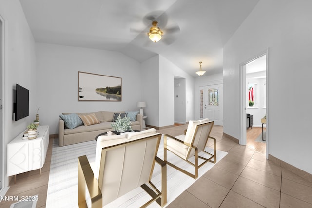 185 Marmot Dr, Reno, NV 89523 - living area featuring a ceiling fan, light tile patterned flooring, and vaulted ceiling