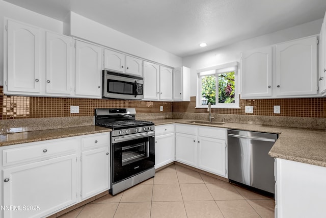 185 Marmot Dr, Reno, NV 89523 - kitchen featuring appliances with stainless steel finishes, white cabinetry, and recessed lighting