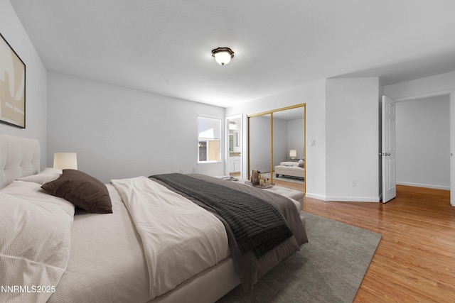 185 Marmot Dr, Reno, NV 89523 - bedroom with wood finished floors and a closet