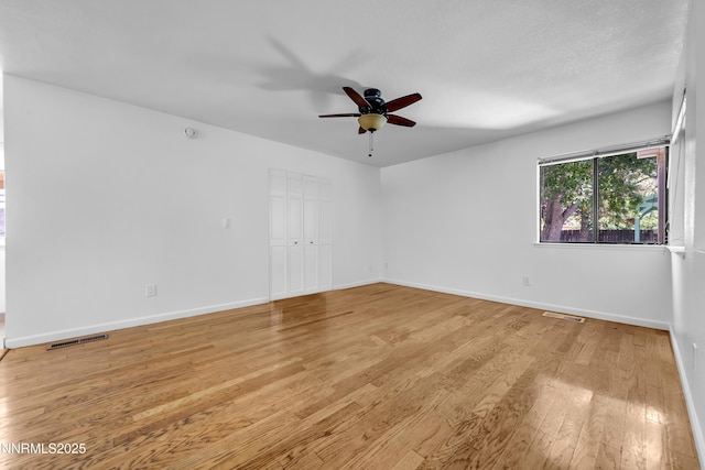185 Marmot Dr, Reno, NV 89523 - spare room featuring a ceiling fan and light wood-style floors