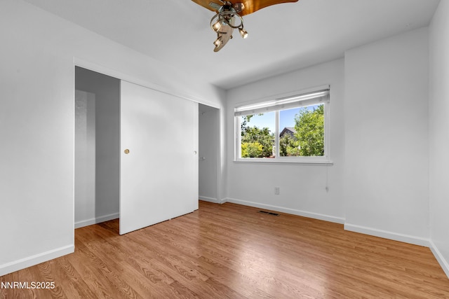 185 Marmot Dr, Reno, NV 89523 - unfurnished bedroom featuring light wood-type flooring and a closet