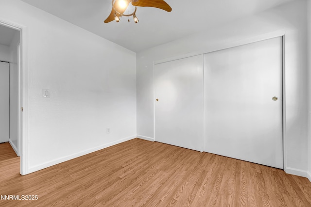 185 Marmot Dr, Reno, NV 89523 - unfurnished bedroom with wood finished floors, a closet, and ceiling fan