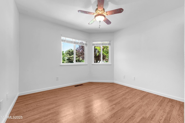 185 Marmot Dr, Reno, NV 89523 - empty room with a ceiling fan and wood finished floors