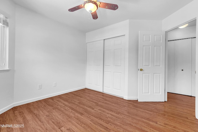185 Marmot Dr, Reno, NV 89523 - unfurnished bedroom featuring wood finished floors, a ceiling fan, and a closet