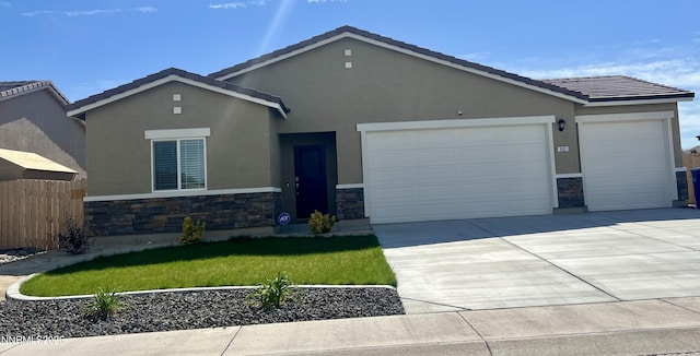 832 Karry Way, Fallon, NV 89406 - view of front of property featuring stone siding, an attached garage, and stucco siding