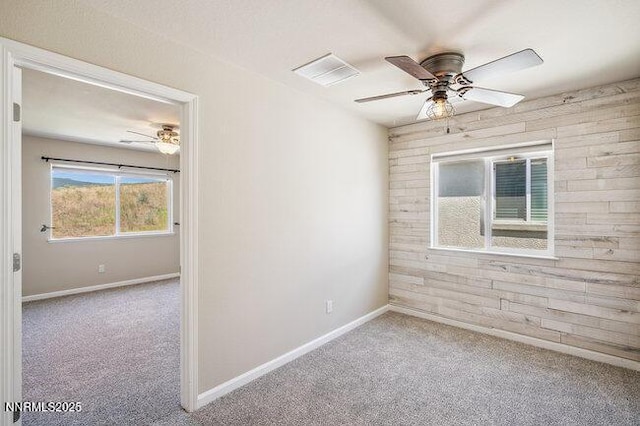 1825 Star Bright Way, Reno, NV 89523 - carpeted spare room with ceiling fan and baseboards