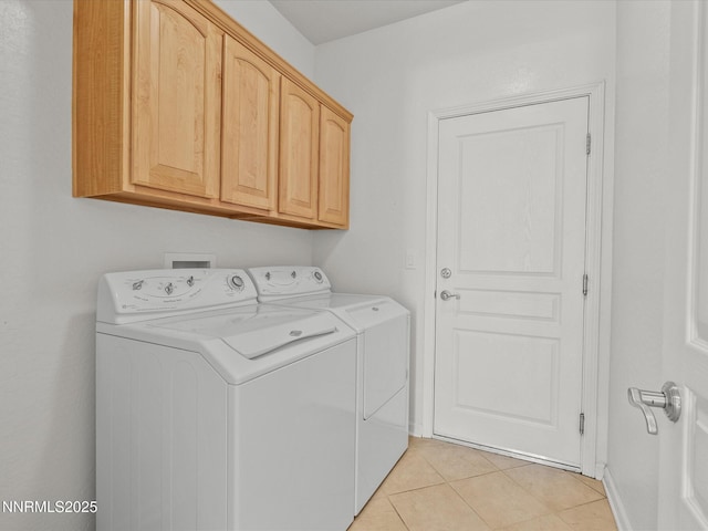 1835 Trail Creek Way, Reno, NV 89523 - laundry room featuring washing machine and clothes dryer, cabinet space, and light tile patterned flooring