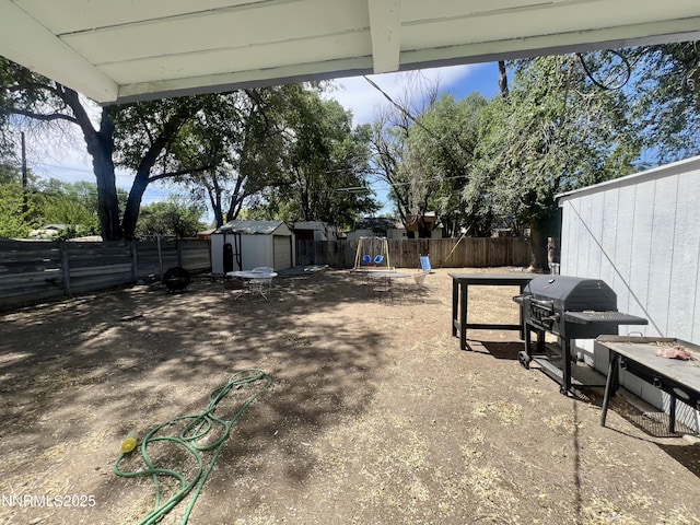 109 M St, Sparks, NV 89431 - fenced backyard with a storage shed