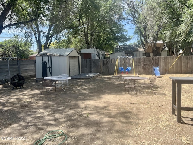 109 M St, Sparks, NV 89431 - fenced backyard with a shed and outdoor dining space