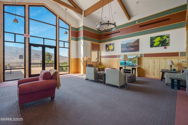 1245 W Del Webb Pkwy, Reno, NV 89523 - lobby featuring a mountain view, high vaulted ceiling, wainscoting, and beamed ceiling