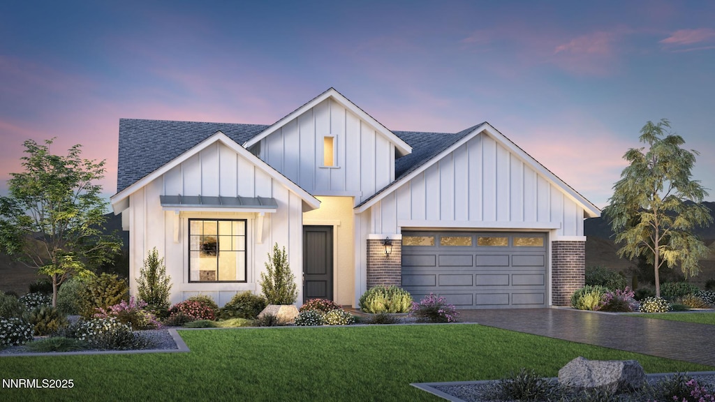 2340 Hammer Falls Dr Unit Claymont 406, Reno, NV 89521 - modern inspired farmhouse with board and batten siding, a shingled roof, a garage, brick siding, and a front lawn