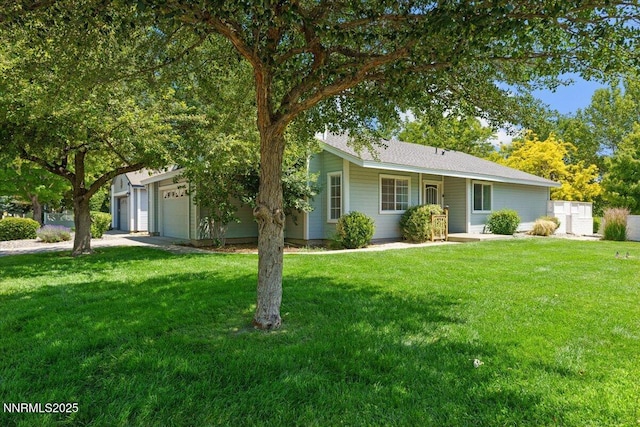 7560 Lighthouse Ln, Reno, NV 89511 - ranch-style home with an attached garage and a front yard