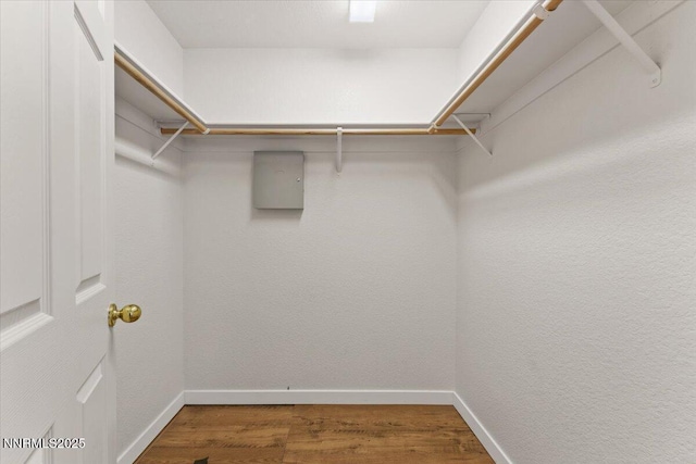 7560 Lighthouse Ln, Reno, NV 89511 - spacious closet featuring wood finished floors