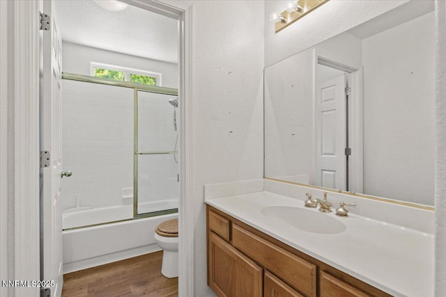 7560 Lighthouse Ln, Reno, NV 89511 - bathroom with wood finished floors, vanity, and combined bath / shower with glass door