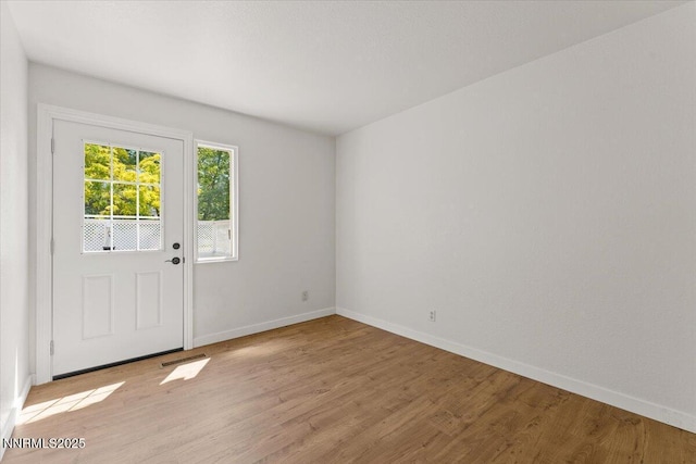 7560 Lighthouse Ln, Reno, NV 89511 - spare room featuring light wood-style flooring and baseboards