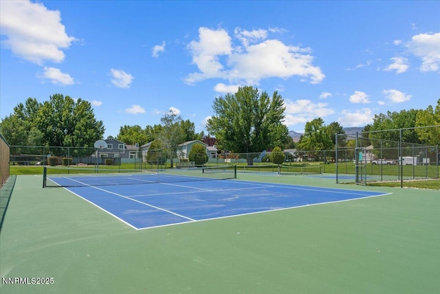 7560 Lighthouse Ln, Reno, NV 89511 - view of tennis court featuring community basketball court