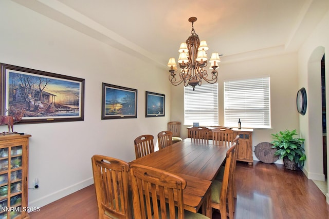 15180 Redmond Lp, Reno, NV 89511 - dining area with a chandelier and dark wood-style flooring