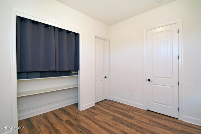 15180 Redmond Lp, Reno, NV 89511 - unfurnished bedroom with wood finished floors and baseboards