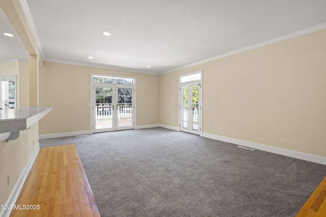 224 Foothill Meadows Ct, Genoa, NV 89411 - unfurnished living room with french doors, plenty of natural light, crown molding, recessed lighting, and light wood-style floors