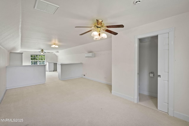 224 Foothill Meadows Ct, Genoa, NV 89411 - unfurnished living room with a ceiling fan, vaulted ceiling, light colored carpet, and a wall unit AC