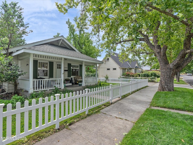 1016 Nixon Ave, Reno, NV 89509 - bungalow-style home with covered porch, a shingled roof, and a fenced front yard