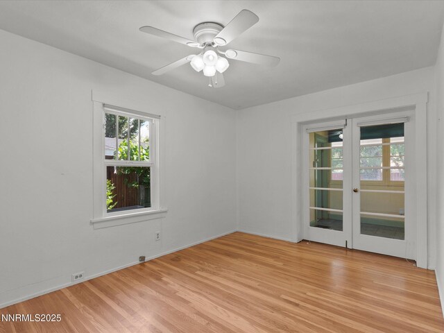 1016 Nixon Ave, Reno, NV 89509 - empty room with french doors, light wood-style floors, and a ceiling fan