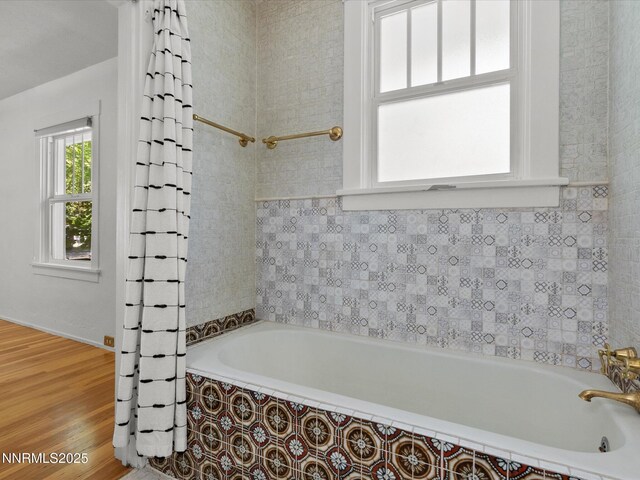 1016 Nixon Ave, Reno, NV 89509 - bathroom with tiled shower / bath and wood finished floors