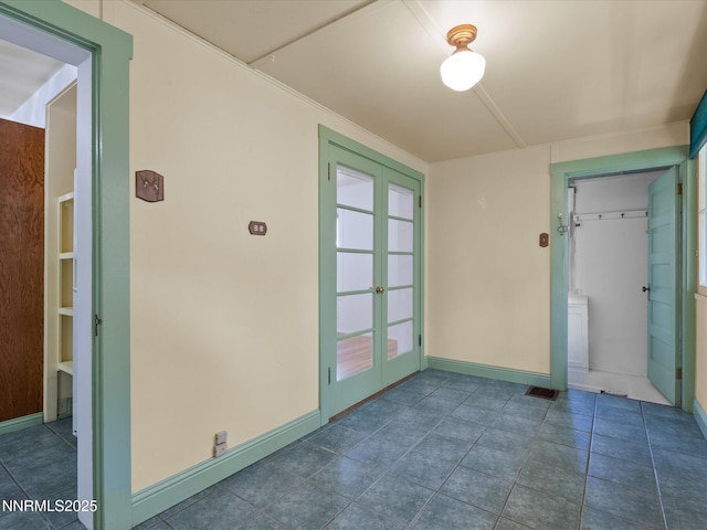 1016 Nixon Ave, Reno, NV 89509 - tiled empty room featuring french doors and baseboards