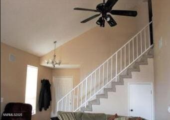 1544 Woodhaven Ln, Sparks, NV 89434 - stairway featuring ceiling fan, lofted ceiling, and a chandelier